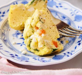 Pinterest graphic of an egg muffin cut in half on a plate with a fork.