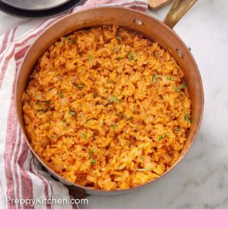 Pinterest graphic of a pot of Mexican rice with bowls, forks, and cut limes off to the side.