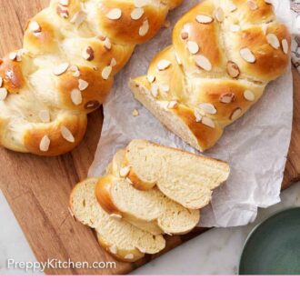 Pinterest graphic of a serving board with parchment paper and two loaves of tsoureki, one with three slices cut.