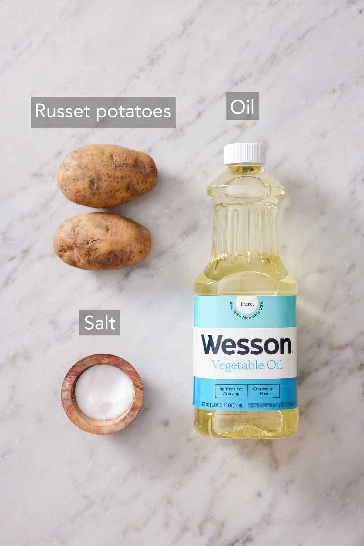 Ingredients needed to make homemade potato chips.