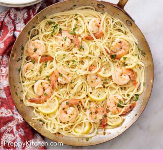 Pinterest graphic of overhead view of a skillet of shrimp linguine.