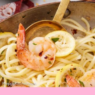 Pinterest graphic of a spoon serving up some shrimp linguine from a skillet.