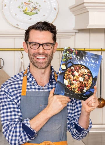 A photo of John Kanell holding his new book.