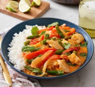 Pinterest graphic of a bowl of Thai red curry with rice.