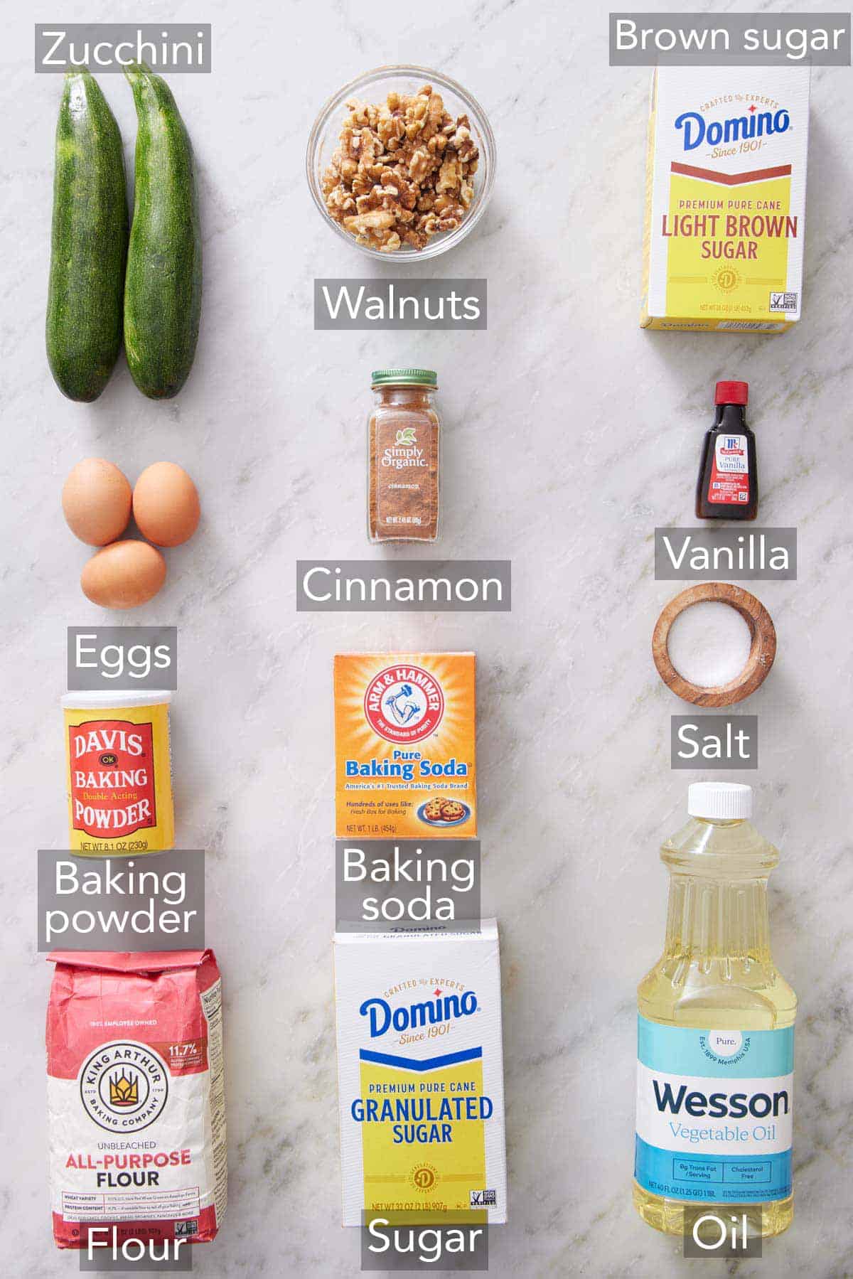 Ingredients needed to make zucchini bread.