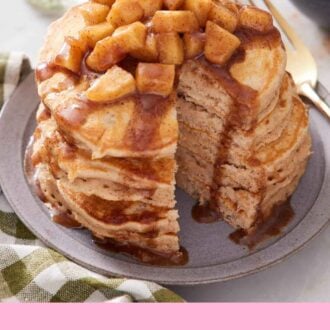 Pinterest graphic of a stack of apple pancakes with apples and syrup on top with a bite cut out.