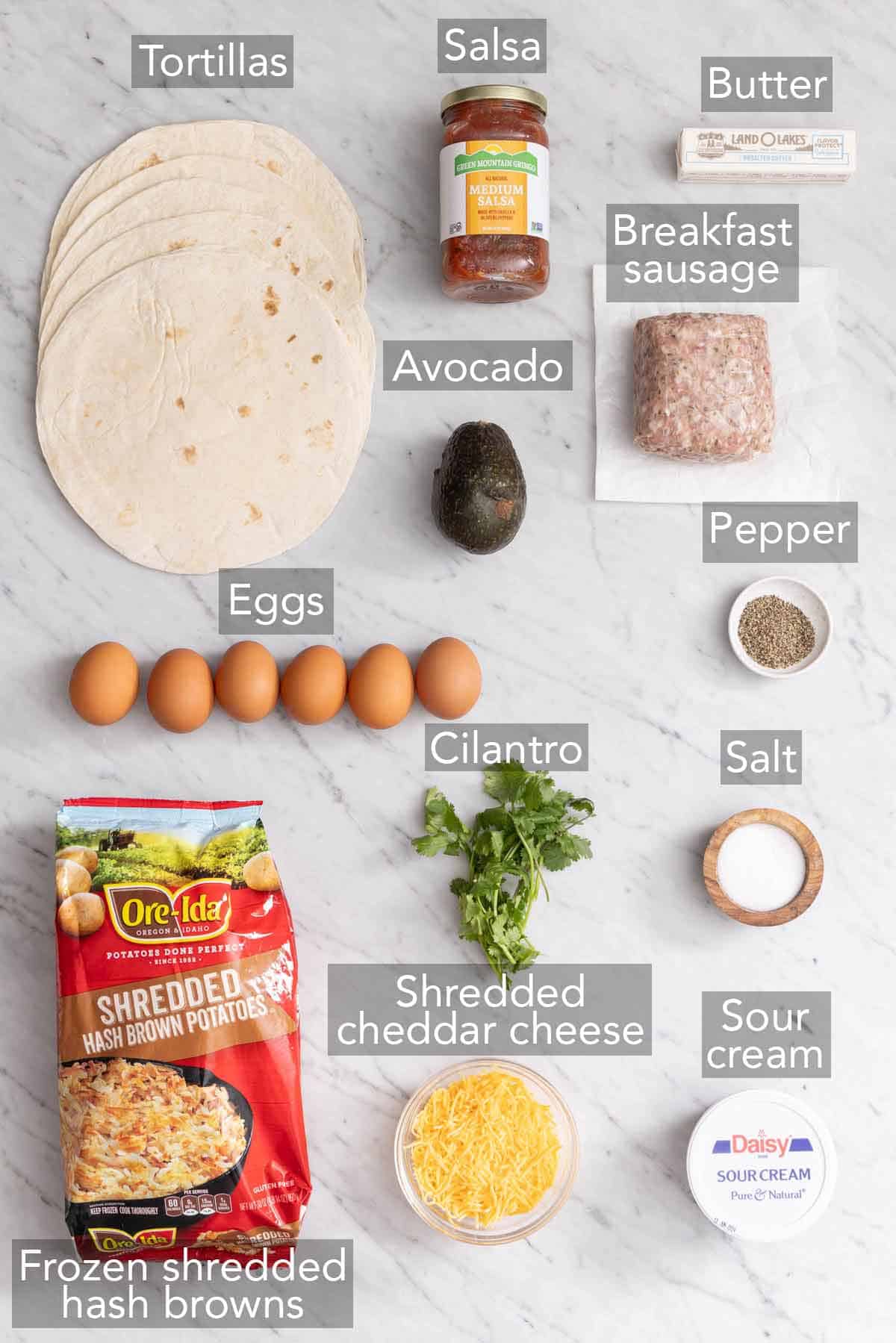 Ingredients needed to make breakfast burritos.