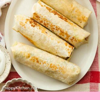Pinterest graphic of an overhead view of breakfast burritos on a white plater.