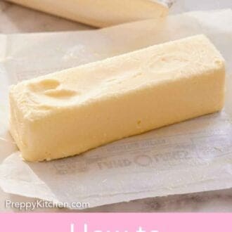 Pinterest graphic of a stick of softened butter in an opened wrapper. A second stick of wrapped butter in the background.