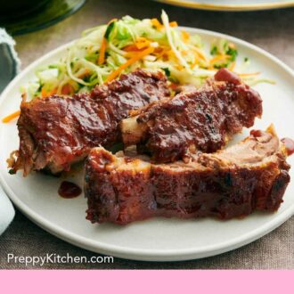 Pinterest graphic of a plate with Instant Pot ribs with vegetable slaw.