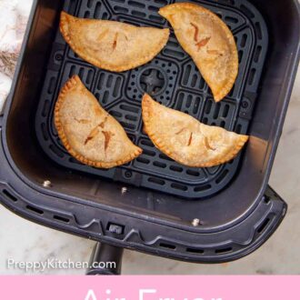 Pinterest graphic of four air fryer hand pies in an air fryer basket.