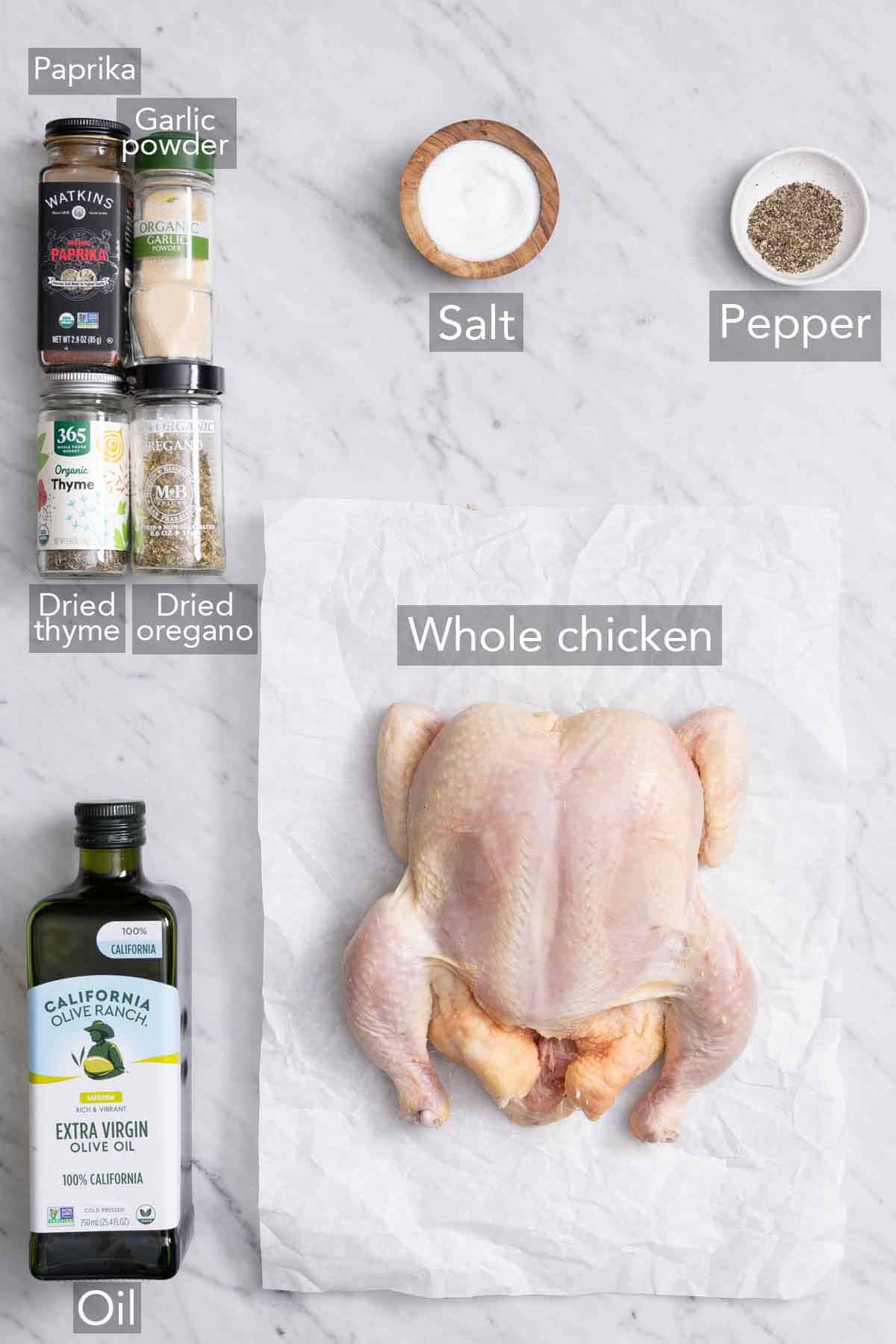 Ingredients needed to make an air fryer whole chicken.