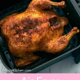 Pinterest graphic of a crispy whole chicken in an air fryer basket.