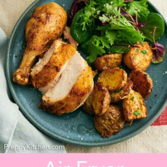 Pinterest graphic of cut chicken pieces on a plate with crispy potatoes and salad.