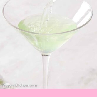Pinterest graphic of a glass with an apple martini poured in from a cocktail shaker.