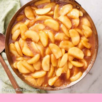 Pinterest graphic of an overhead view of a skillet of apple pie filling.