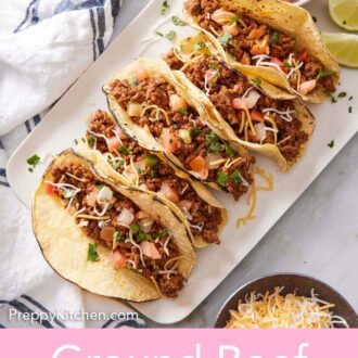 Pinterest graphic of five ground beef tacos on a white platter with a bowl of pico de gallo and lime wedges.