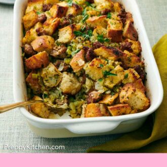 Pinterest graphic of an angled view of a baking dish of sausage stuffing with a bit scooped out onto a plate in the background.