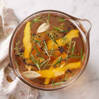 A measuring cup of turkey brine.