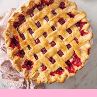 Pinterest graphic of an overhead view of a cranberry pie with a lattice top crust.