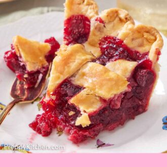 Pinterest graphic of a plate with a slice of cranberry pie with the tip broken off on a fork beside it.