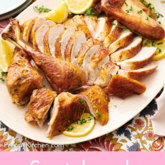 Pinterest graphic of a platter with a sliced spatchcock turkey surrounded by fresh herbs and cut lemons.