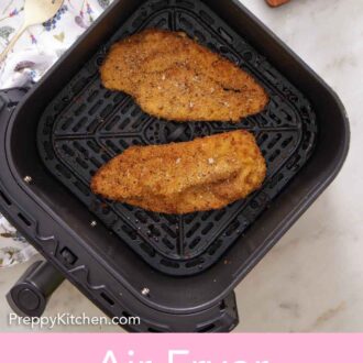 Pinterest graphic of an overhead view of two crispy chicken cutlets in an air fryer basket.