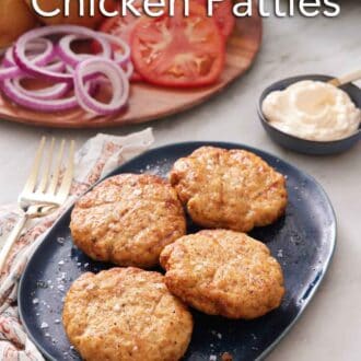 Pinterest graphic of a platter with four air fryer chicken patties. Burger toppings in the back.