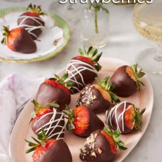Pinterest graphic of a platter of chocolate covered strawberries with a small vase of flowers and small plate with two chocolate covered strawberries in the background.