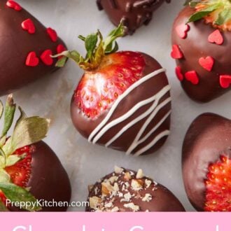 Pinterest graphic of an assortment of chocolate covered strawberries in a single layer.