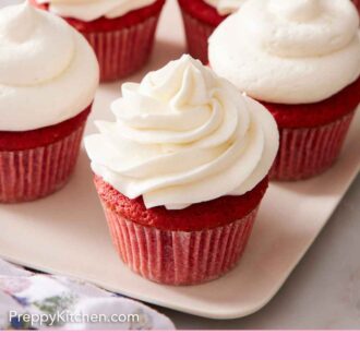 Pinterest graphic of a platter of seven red velvet cupcakes with ermine frosting.