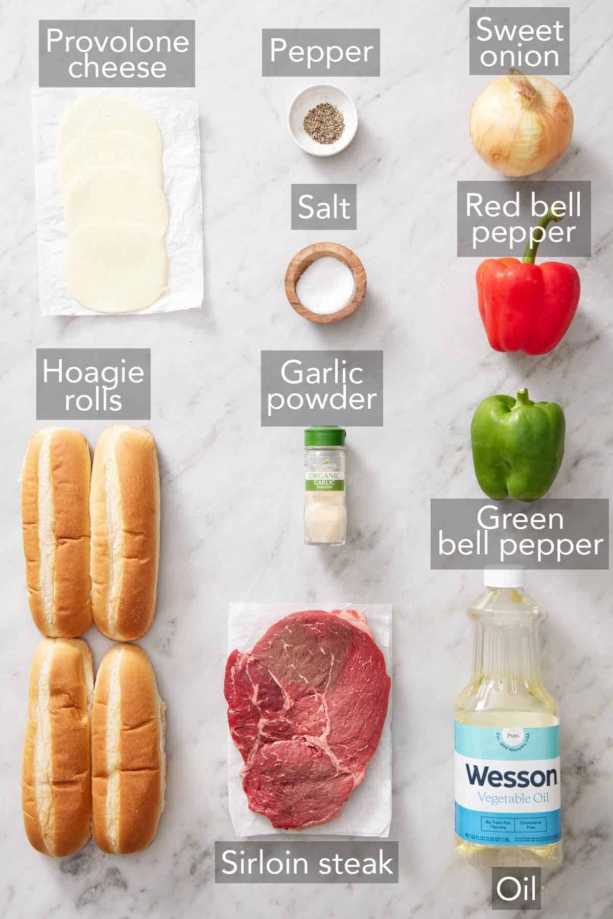 Ingredients needed to make homemade Philly cheesesteak sandwiches.