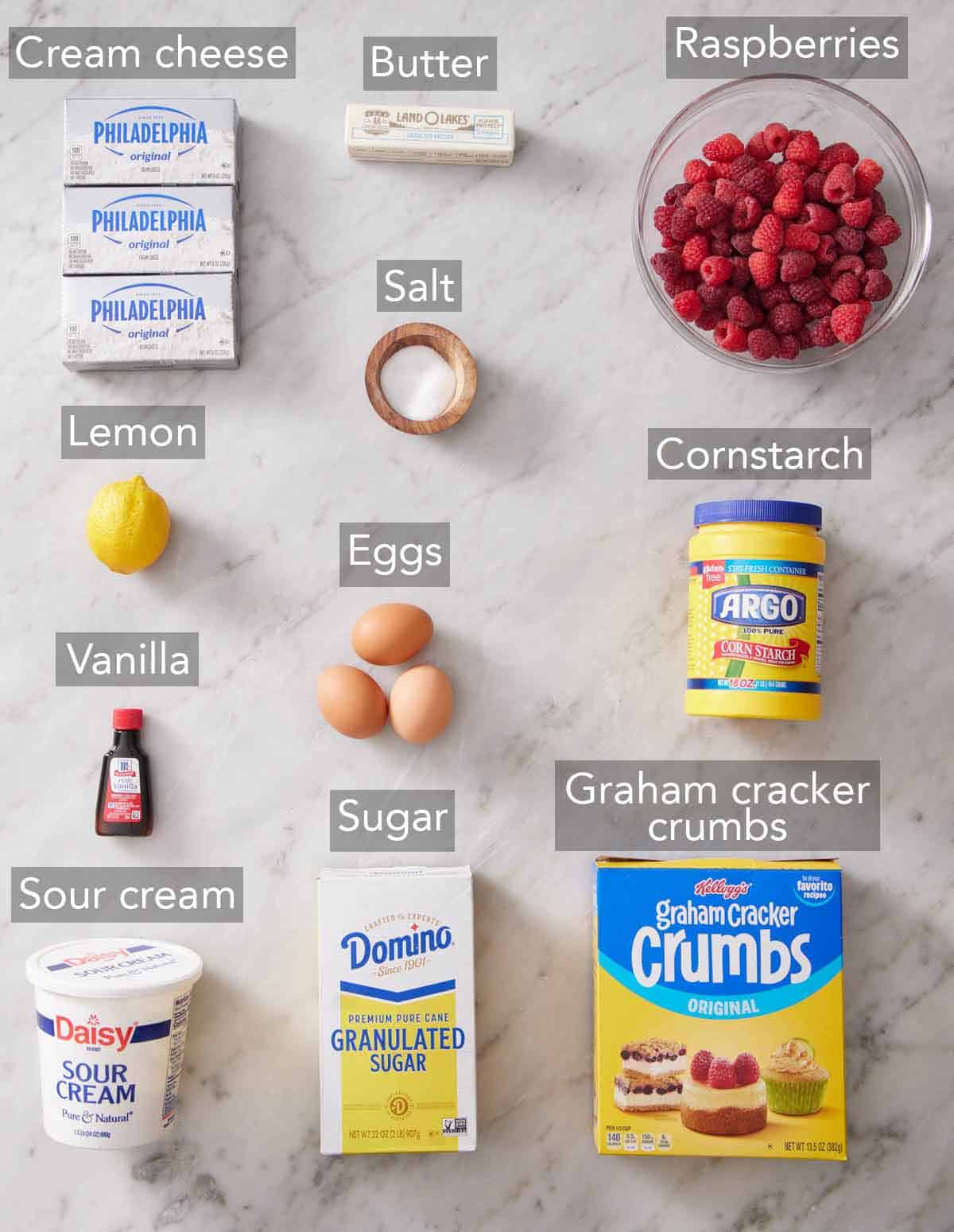 Ingredients needed to make raspberry cheesecake.