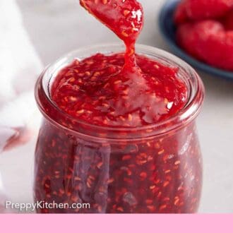 Pinterest graphic of a spoon lifting up some raspberry jam from a jar.
