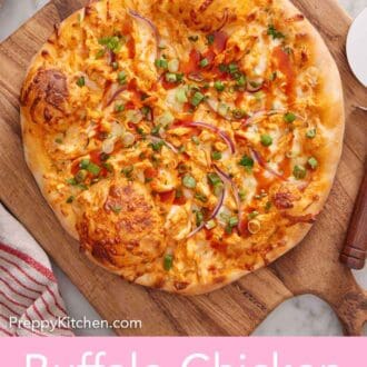 Pinterest graphic of an overhead view of an uncut buffalo chicken pizza on a wooden serving board.