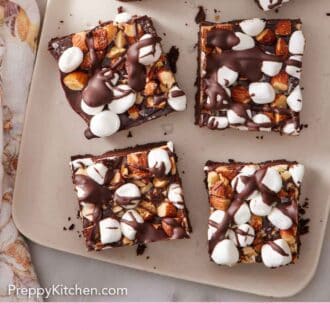 Pinterest graphic of six rocky road bars on a serving platter.