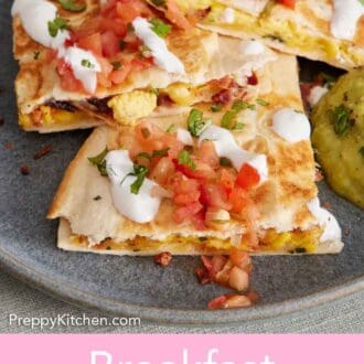 Pinterest graphic of a close up view of three pieces of breakfast quesadillas topped with pico de gallo, sour cream, and cilantro.