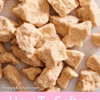 Pinterest graphic of an overhead view of brown sugar in chunks.