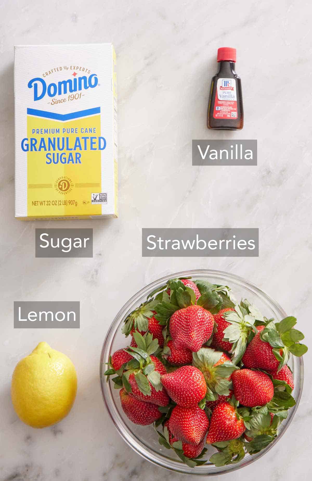 Ingredients needed to make strawberry sauce.