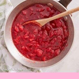 Pinterest graphic of a pot of strawberry sauce with a wooden spoon.