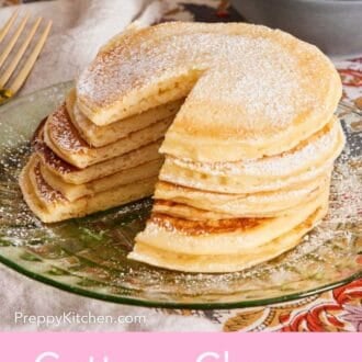 Pinterest graphic showing a stack of cottage cheese pancakes on a plate, dusted with powdered sugar.