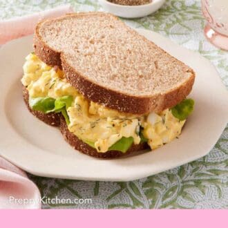 Pinterest graphic showing an egg sandwich with lettuce.