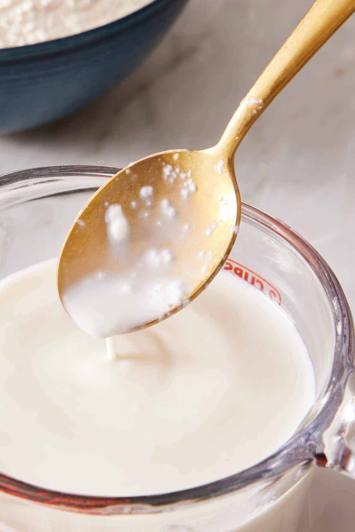 Close-up showing homemade buttermilk's texture.
