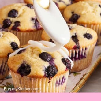 Pinterest graphic of lemon glaze drizzled over homemade muffins on a platter.