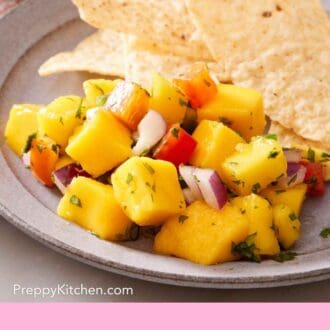 Pinterest graphic showing a close-up of salsa on a plate with chips.