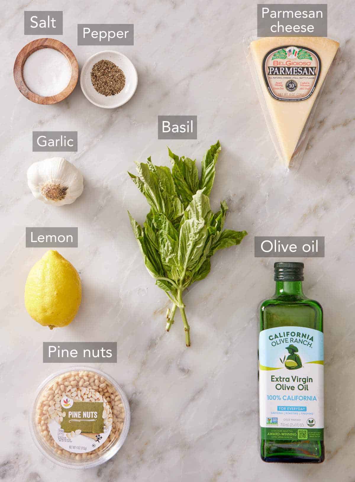 Ingredients needed to make basil pesto.