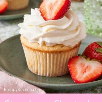 Pinterest graphic showing a cupcake with whipped topping and halved strawberries.
