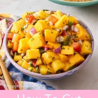 Pinterest graphic showing mango salsa in a bowl with tortilla chips in the background.