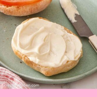 Pinterest graphic showing mayonnaise spread on half a roll.