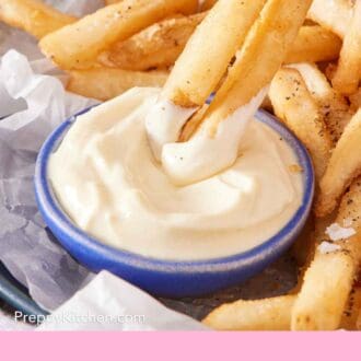 Pinterest graphic showing fries dipped into a small bowl of mayonnaise.